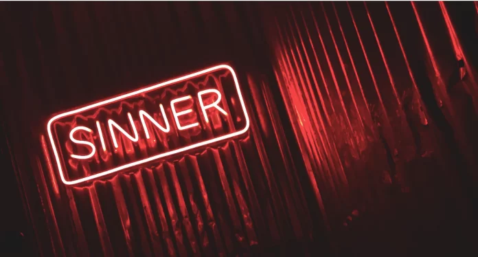 Sinner Red neon sign reading 'Sinner'