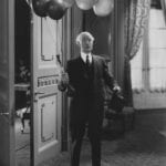 comedic-looking-man-with-balloons