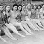 Row-of-beautiful-women-in-swimsuits-poolside